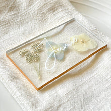 Load image into Gallery viewer, pressed blue flower place cards with gold lining on plate setting
