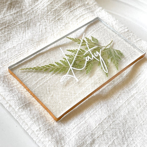 pressed fern wedding place cards with gold lining closeup