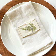 Load image into Gallery viewer, pressed fern wedding place card on a plate setting
